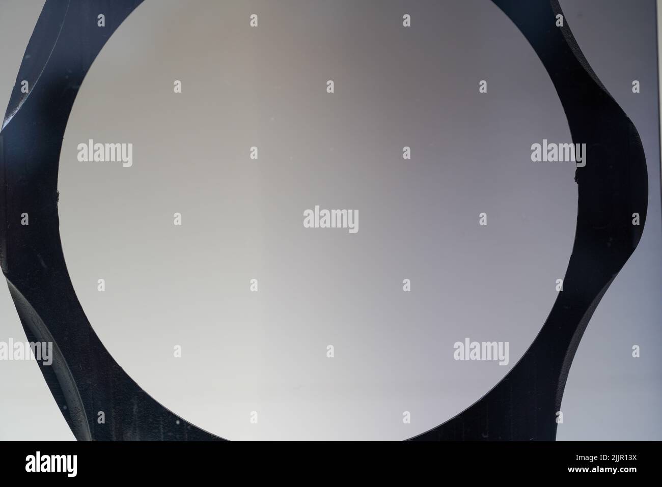 A black metal frame on a white wall background Stock Photo Alamy