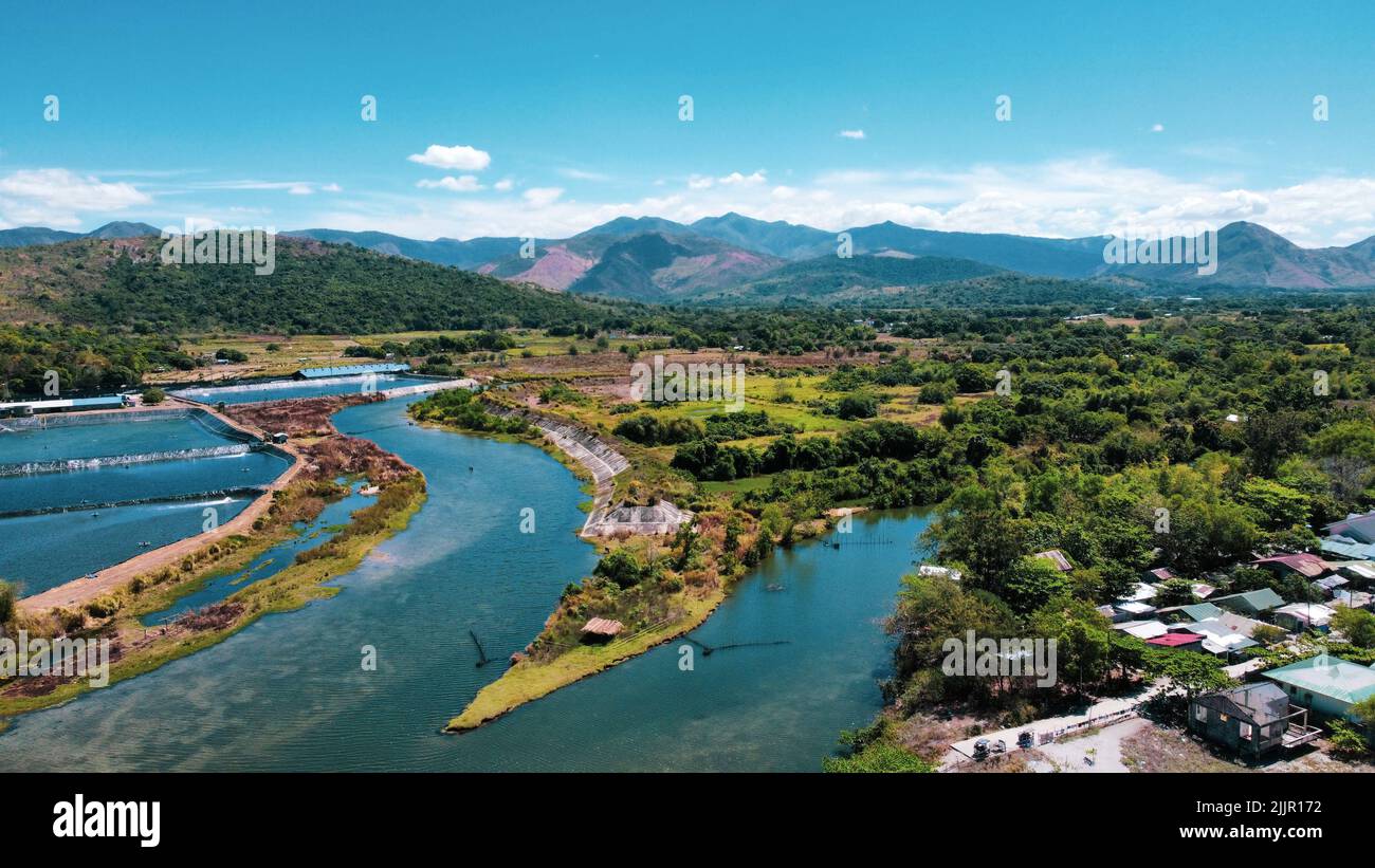 An aerial shot of two splitting rivers surrounded by a wild landscape. Stock Photo