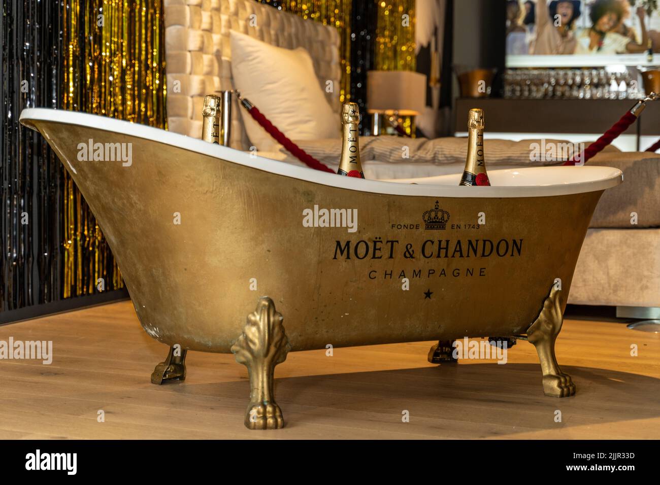 A golden bathtub with Moet & Chandon Champagnes inside Stock Photo Alamy