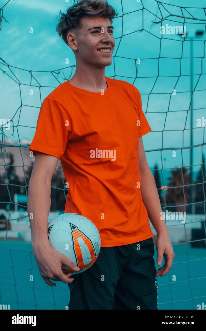 A blonde Spanish football player near the gates Stock Photo Alamy