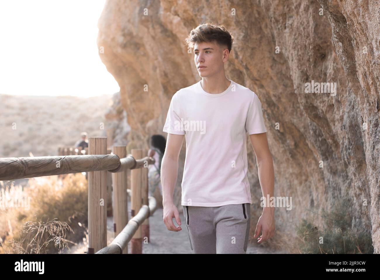 Young male hiker smiling hi-res stock photography and images - Alamy