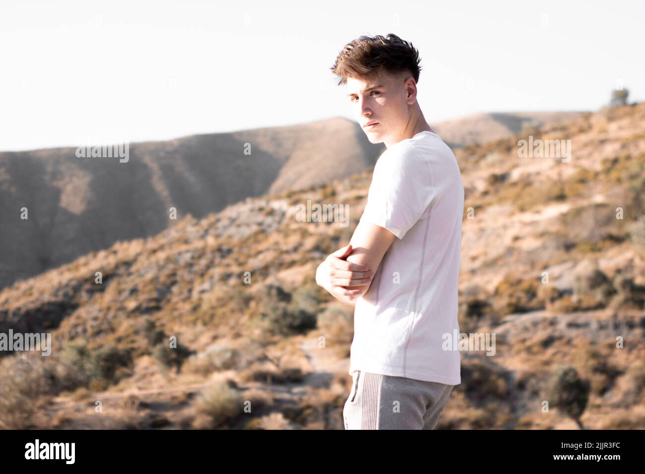 Young male hiker smiling hi-res stock photography and images - Alamy