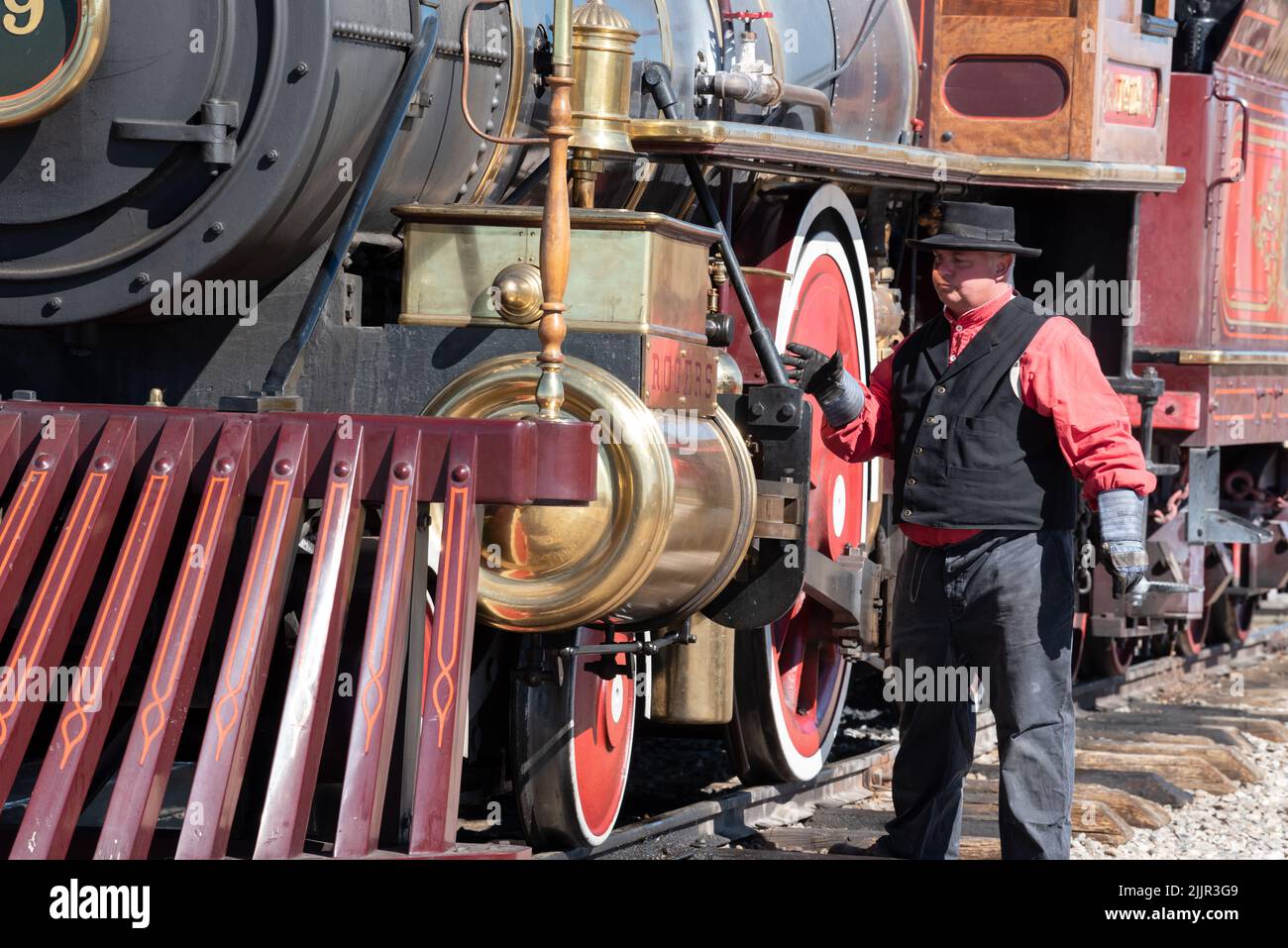 Engineer checking Locomotive 119 at demonstration session, Golden Spike National Historic Park, Utah. Stock Photo