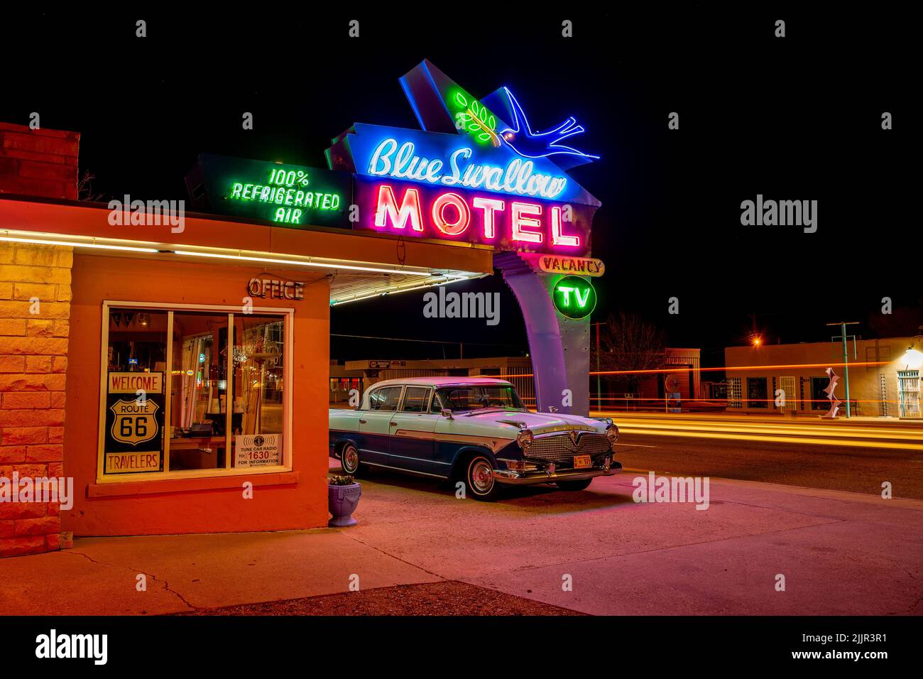The Blue Swallow Motel with parked vintage car in Tucumcari, New Mexico