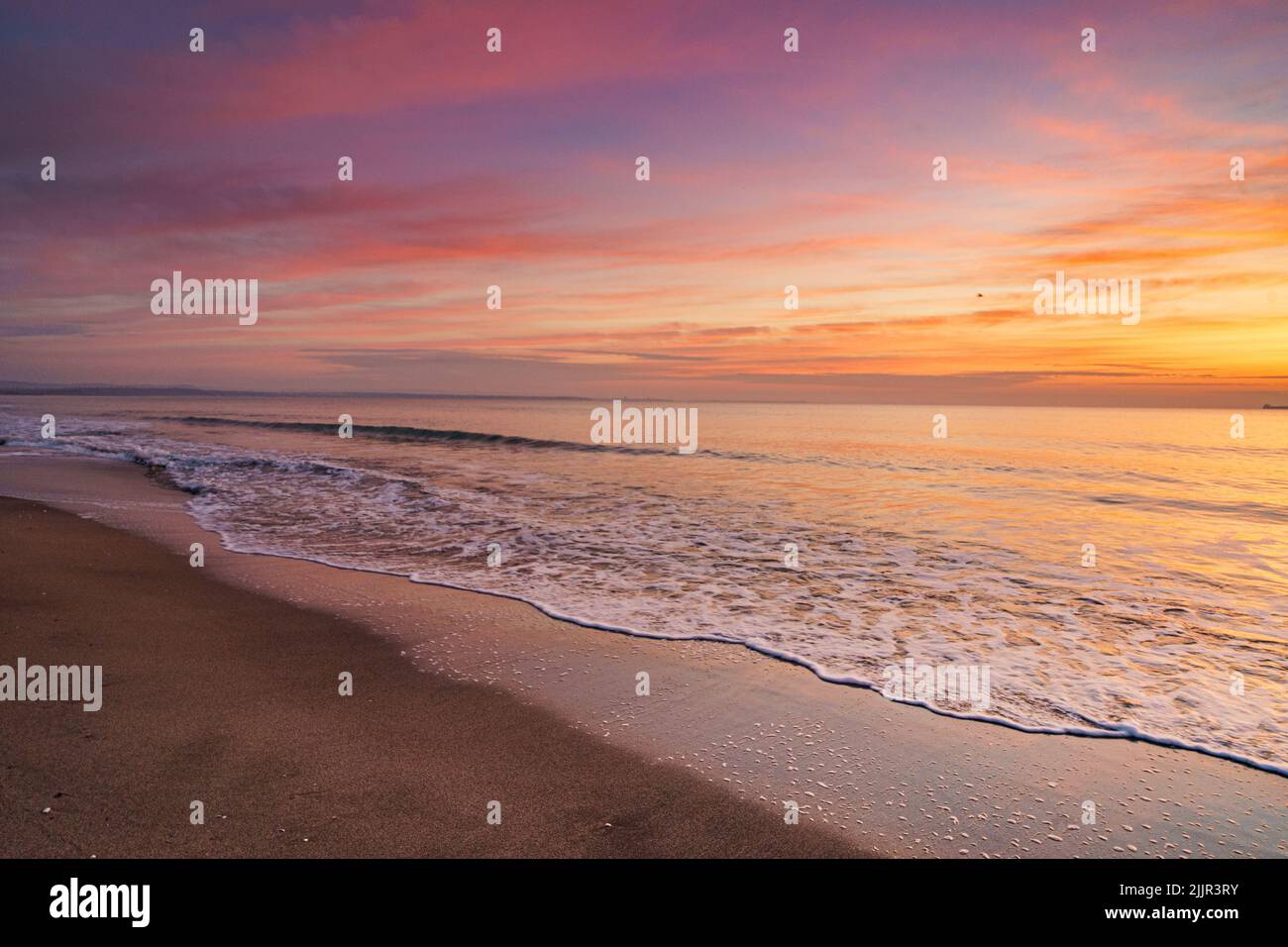 The beautiful sunset at the beach Stock Photo - Alamy