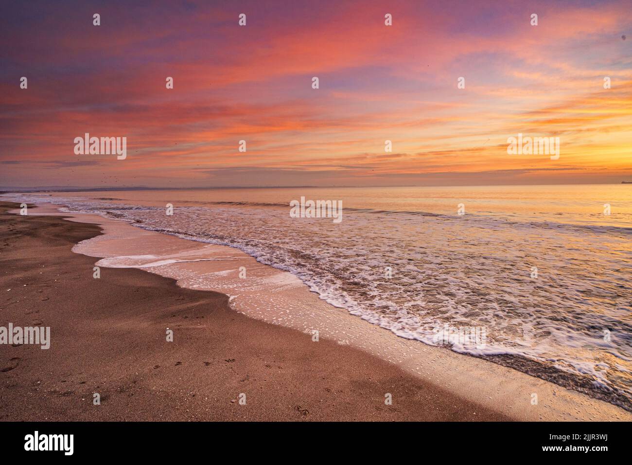 The beautiful sunset at the beach Stock Photo - Alamy