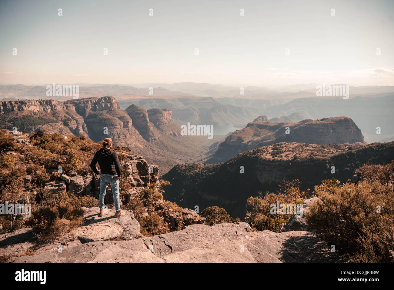 Back view young tourist man hi-res stock photography and images - Alamy