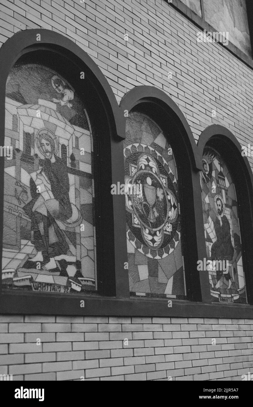 A religious wall with pictures of Jesus in the church Stock Photo Alamy