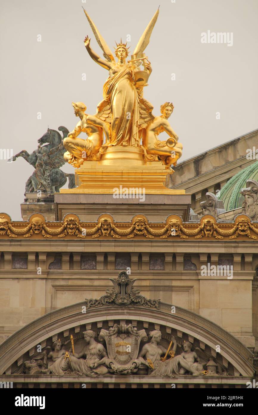 A vertical shot of the statue of the Opera house of Paris in France Stock Photo
