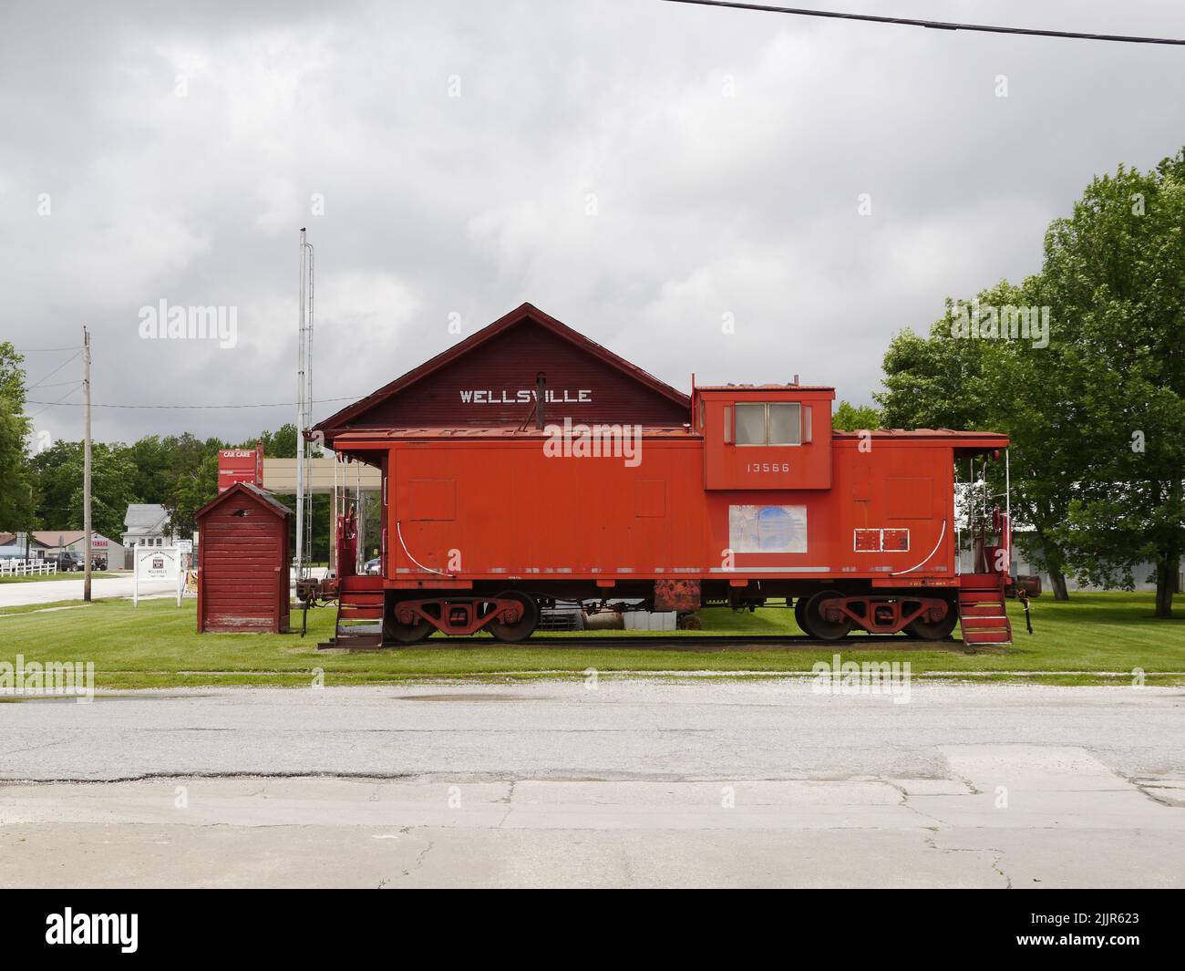 An old railroad caboose at the depot in Wellsville, Missouri Stock