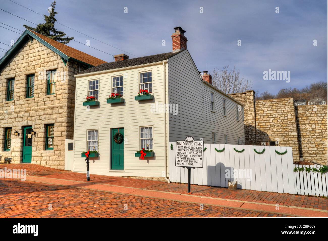 The whitewashed fence of Tom Sawyer fame in historic Hannibal, Missouri Stock Photo