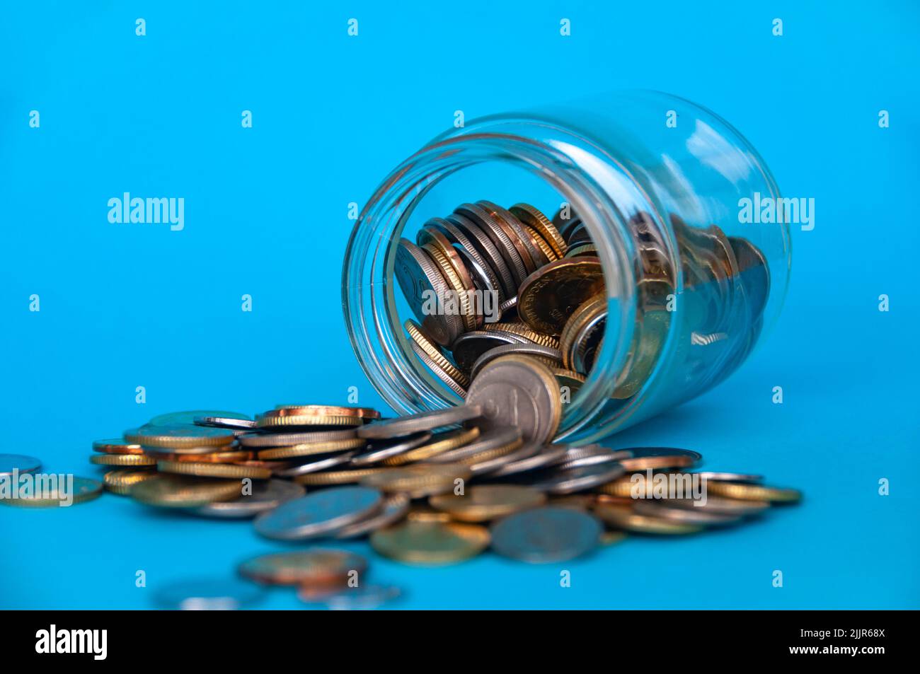 Scattered gold coins with space customizable for text or ideas . Copy space and investment concept Stock Photo