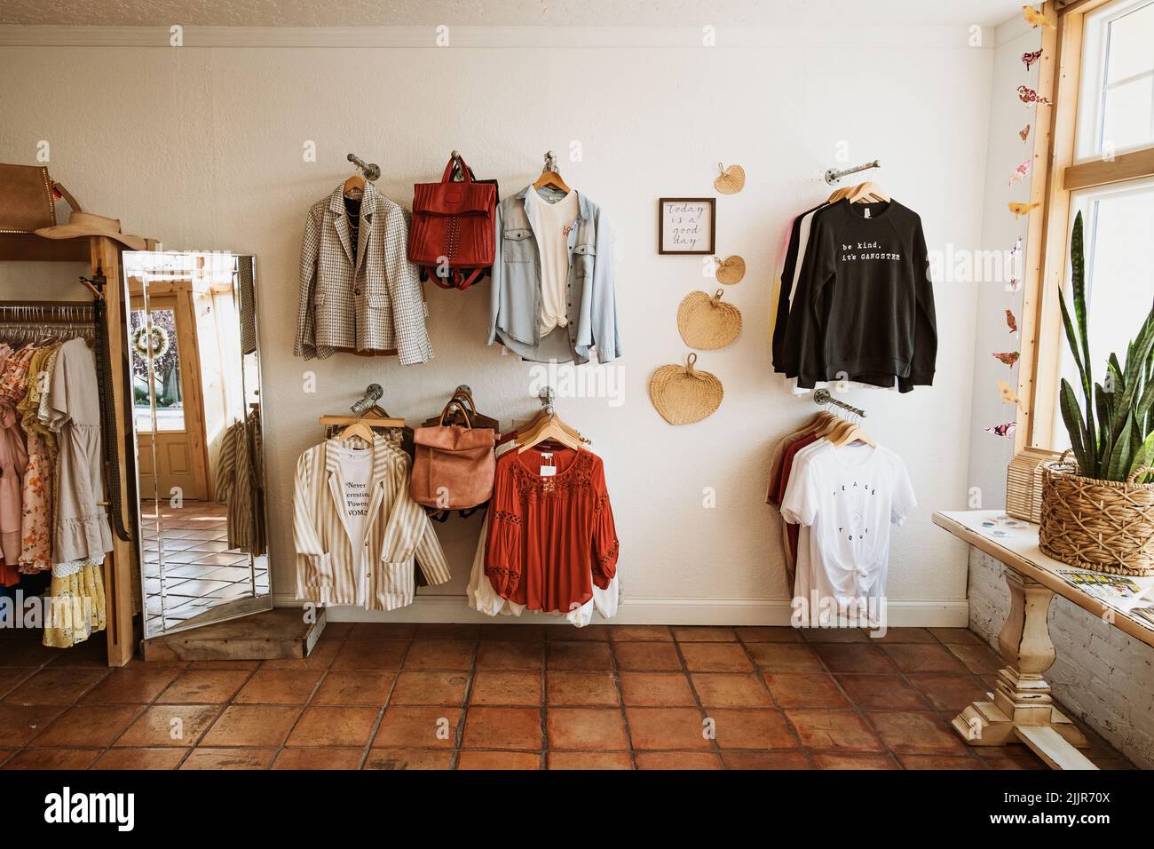 High street retail, small business and commercial interior, fashion store  in the English countryside style, elegant country clothing shop showroom  and luxurious boutique in the old town, generative ai 26658820 Stock Photo