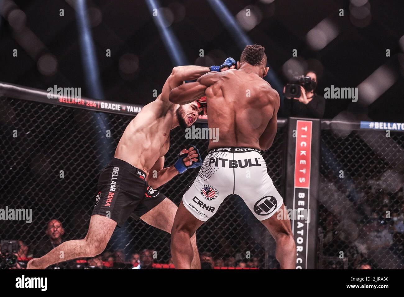 Tofiq Musayev lands a big overhand right to the ear of Sidney Outlaw at Bellator 283. Tofiq Musayev wins by way of Knock Out in the first round from t Stock Photo