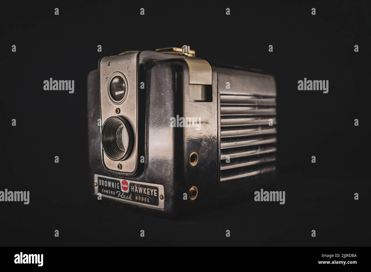 An old vintage camera on a dark background Stock Photo