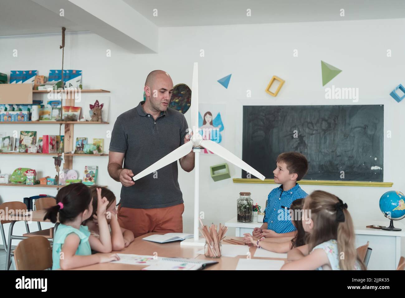 Student Pretending Not To Listen To His Teacher Standing Near Him Stock  Image - Image of classroom, discussion: 139587523