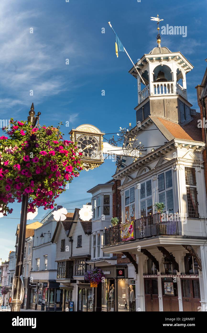 Famous place in England Guildford High Street The Guildhall historic architecture early morning sunlight Guildford Surrey England Europe Stock Photo