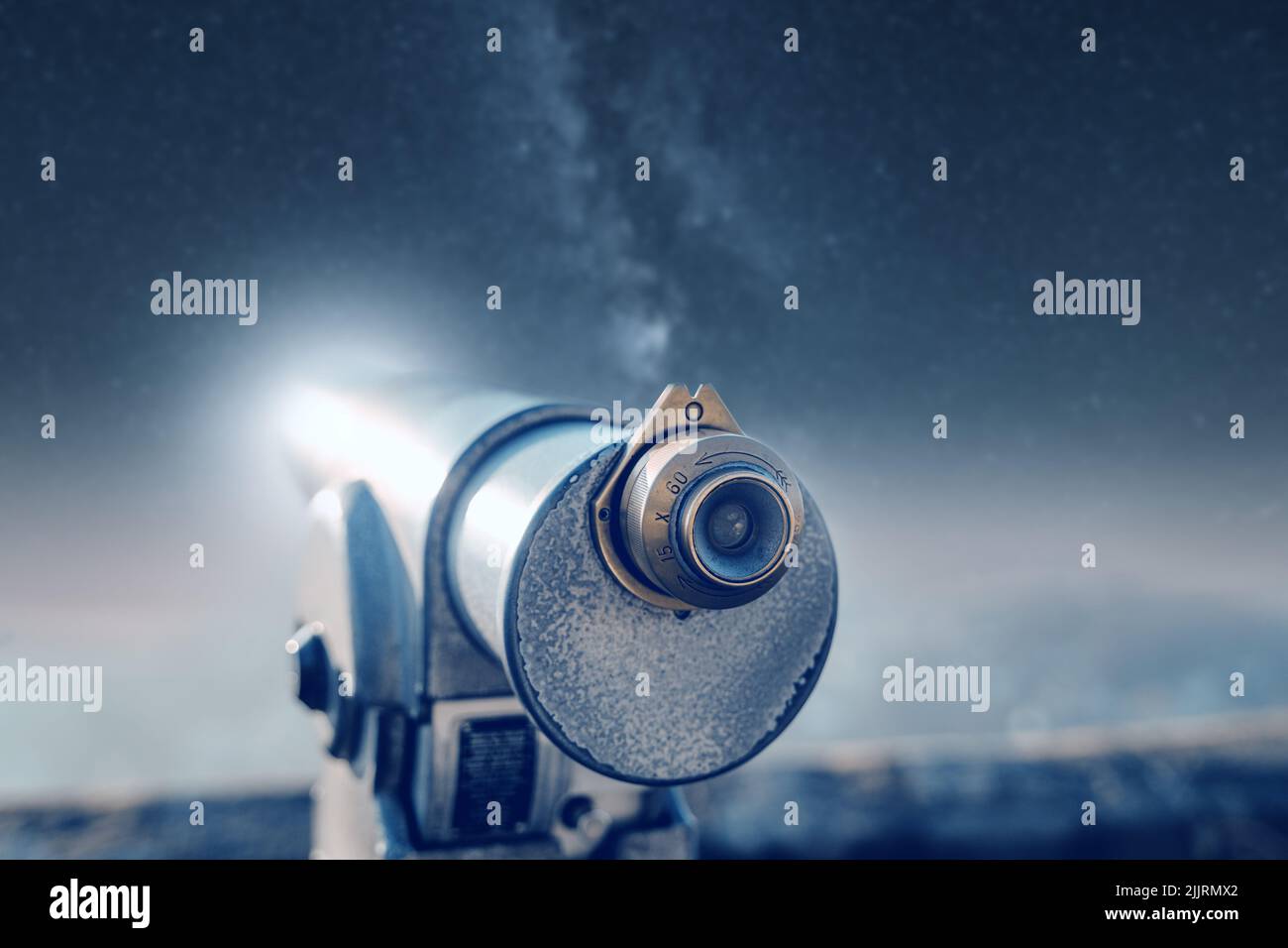 Look at the starry sky with binoculars Stock Photo