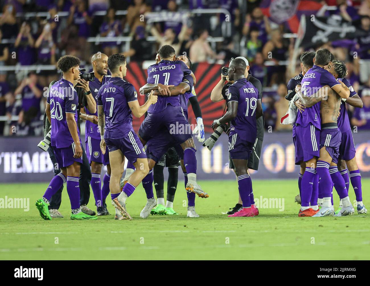 Orlando, FL:  Orlando City celebrates the win and advancing to the finals after the Lamar Hunt U.S. Open Cup Semifinal MLS game, Wednesday, July 27, 2 Stock Photo