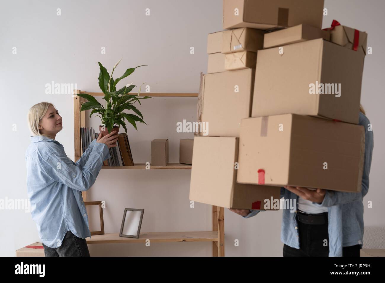 young couple moving to a new house, moving day, new apartment, rental