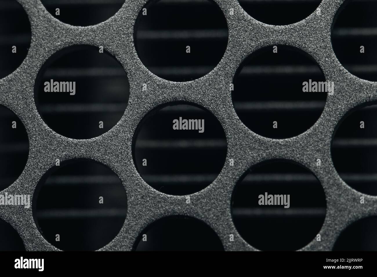 Black metal holes hi-res stock photography and images - Alamy