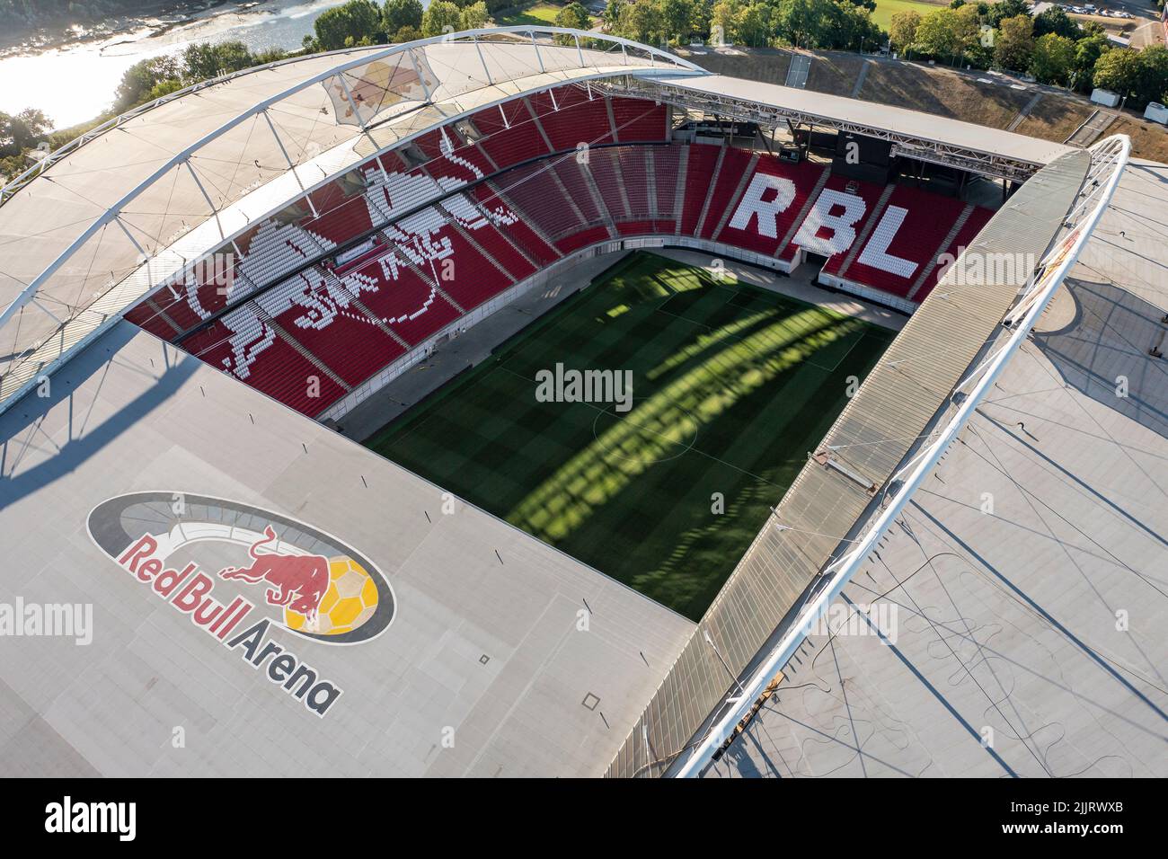 Leipzig, Germany. 27th July, 2022. View of the Red Bull Arena Leipzig, now completely equipped with red seats. RB Leipzig's home arena holds up to 47,069 spectators. (Aerial view with drone) Credit: Jan Woitas/dpa/Alamy Live News Stock Photo