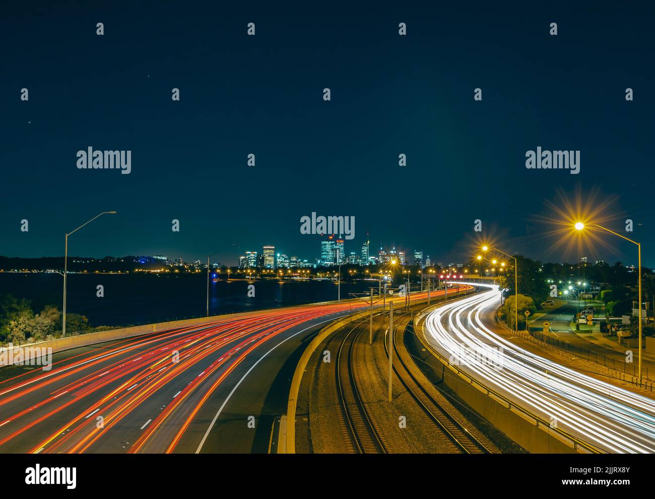 The Perth city light trail at the dark blue night long exposure Stock
