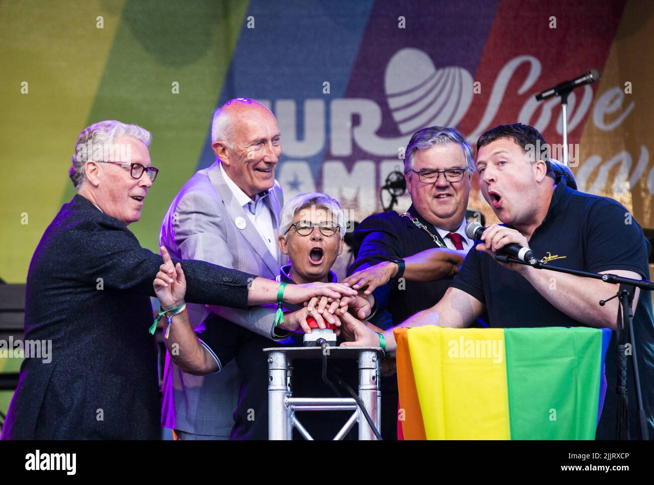 2022-07-27 20:20:23 Jan Markink, Henk Beerten, Sarah Townsend, Mayor Hubert Bruls and Hugh Torrence press the red button together for the opening of the EuroGames on the Waalkade. The LGBTQI+ sporting event is organized in a different city in Europe every year. ANP EVA PLEVIER netherlands out - belgium out Stock Photo