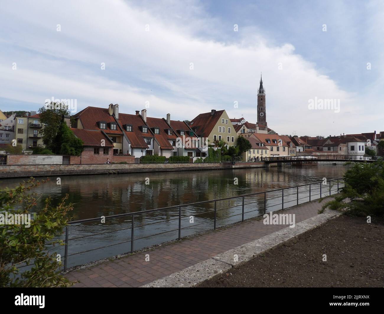 The Landshut riverside with St. Martins Church and Trausnitz Castle in the back in Germany Stock Photo