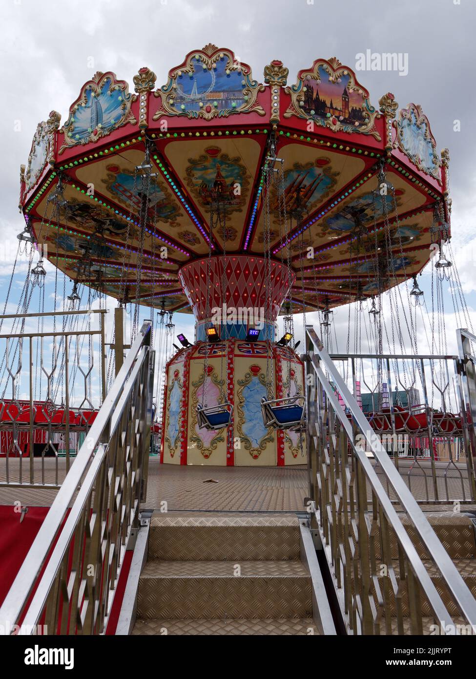 London, Greater London, England, June 30 2022: Fairground swing ride aka chair swing ride inside BST Byde Park concert arena Stock Photo