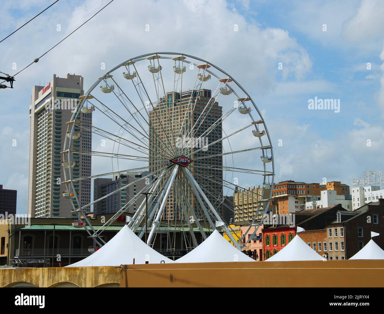 The Ferris wheel setup in the French Quarter of New Orleans for the NCAA Final Four Music Festival. Stock Photo