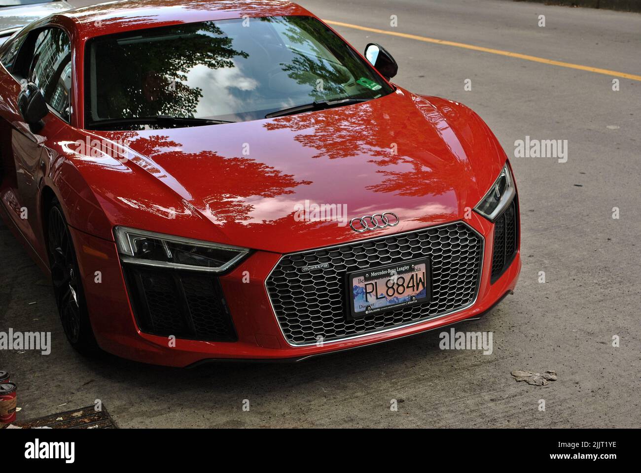 A luxurious red Audi R8 parked on the street of Vancouver, Canada Stock Photo
