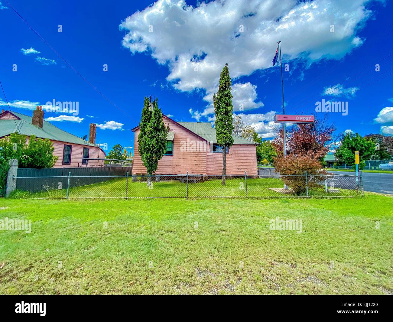 The old Deepwater Post Office building painted pink, located in New