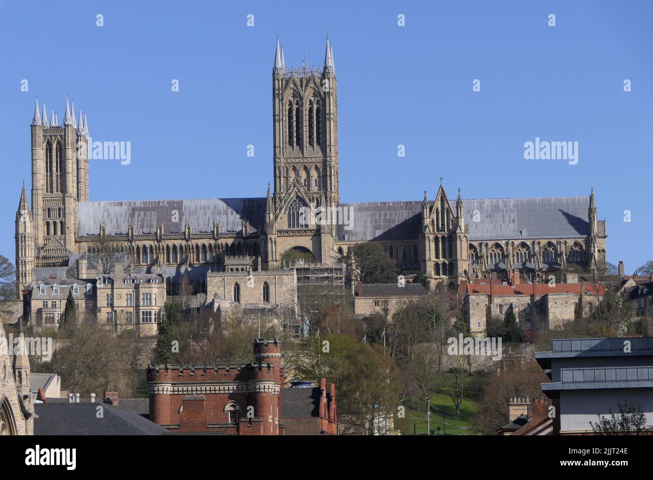 A scenic shot of the Lincoln Cathedral surrounded by buildings in Lincoln, England, UK Stock