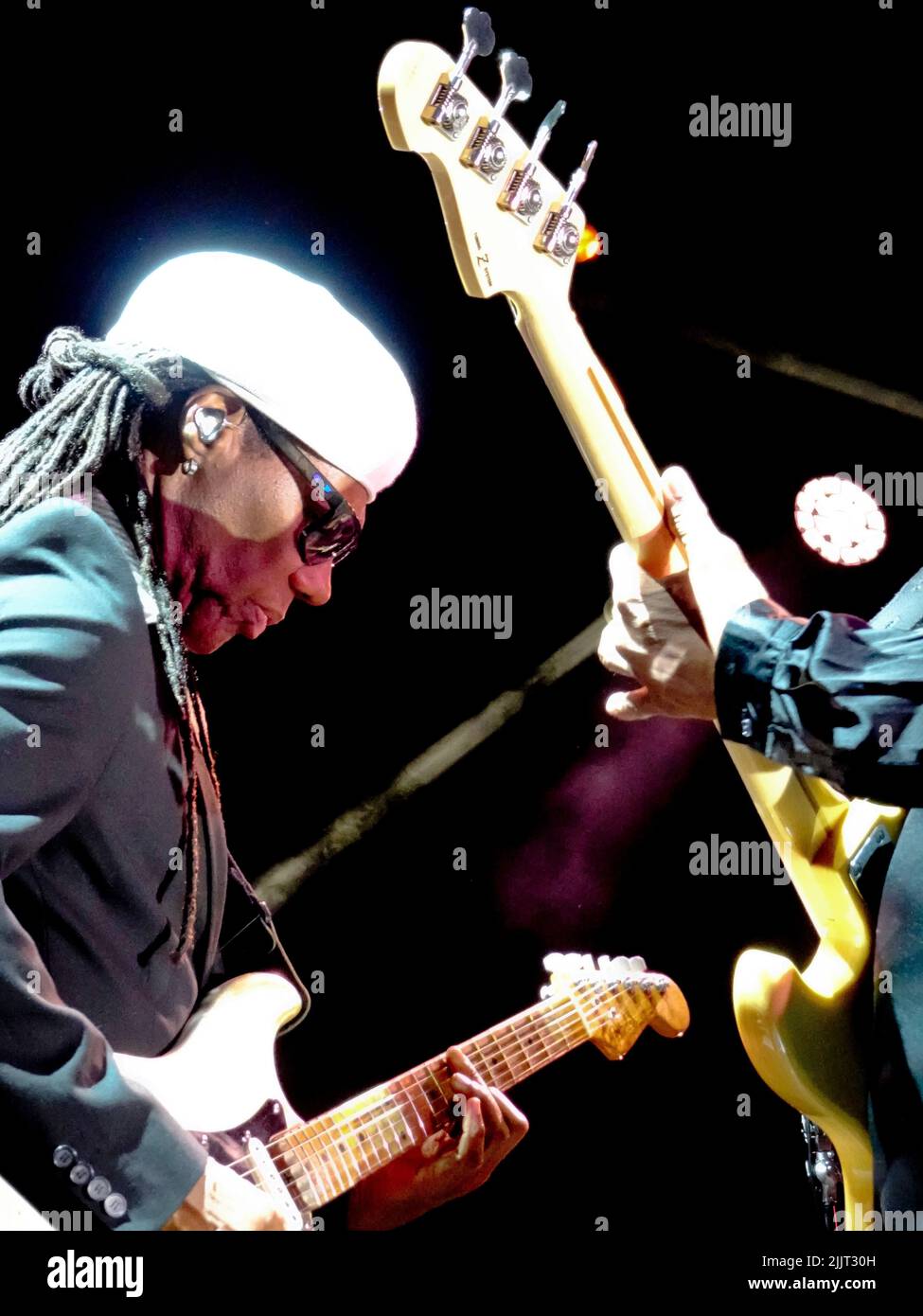 Sandown Park Racecourse, Esher, Surrey, UK. 27th July, 2022. Nile Rodgers and CHIC in concert after racing at the evening horse races at Sandown Park Credit: Motofoto/Alamy Live News Stock Photo