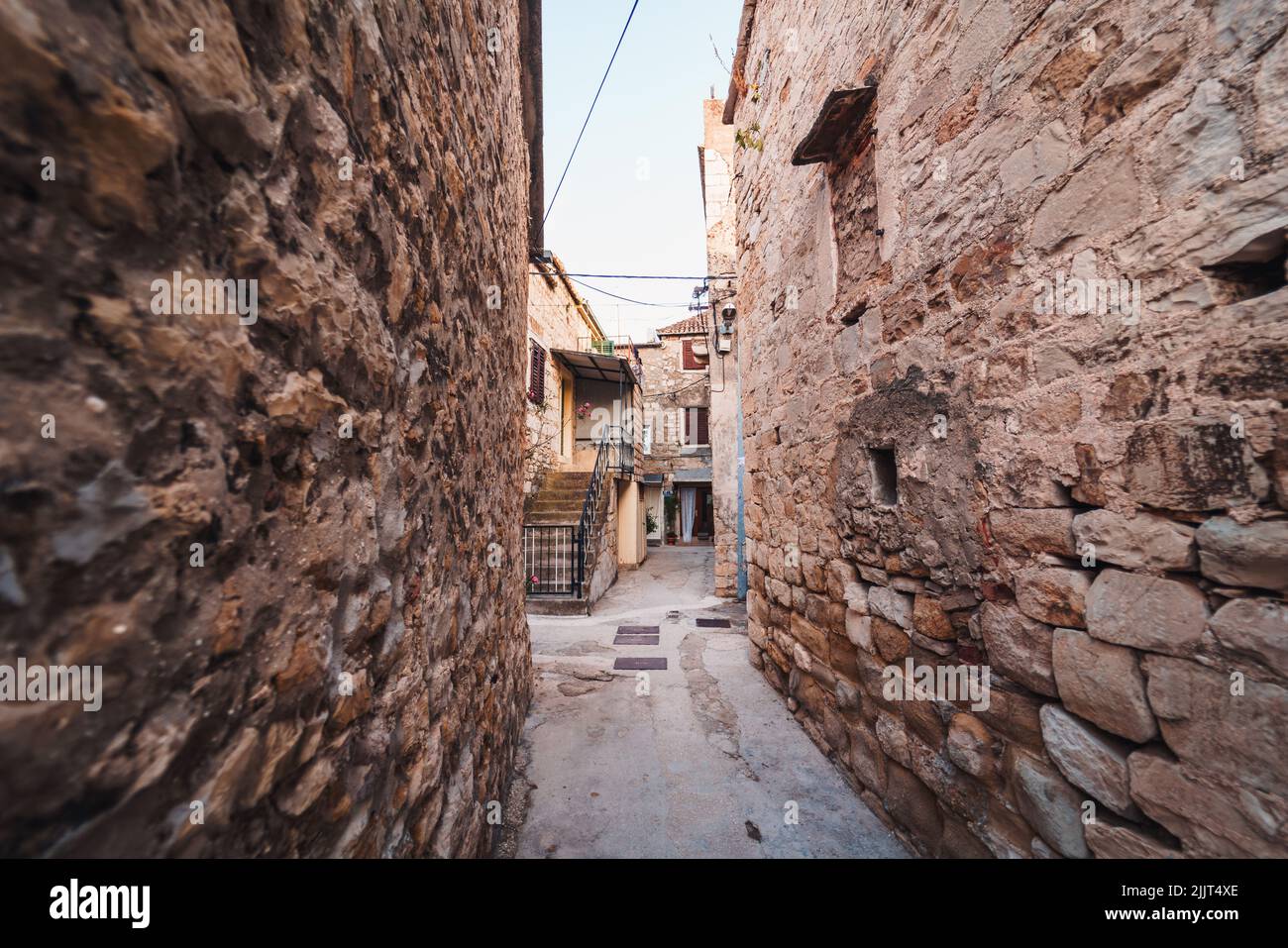 A beautiful view of a narrow street in Primosten, Croatia Stock Photo