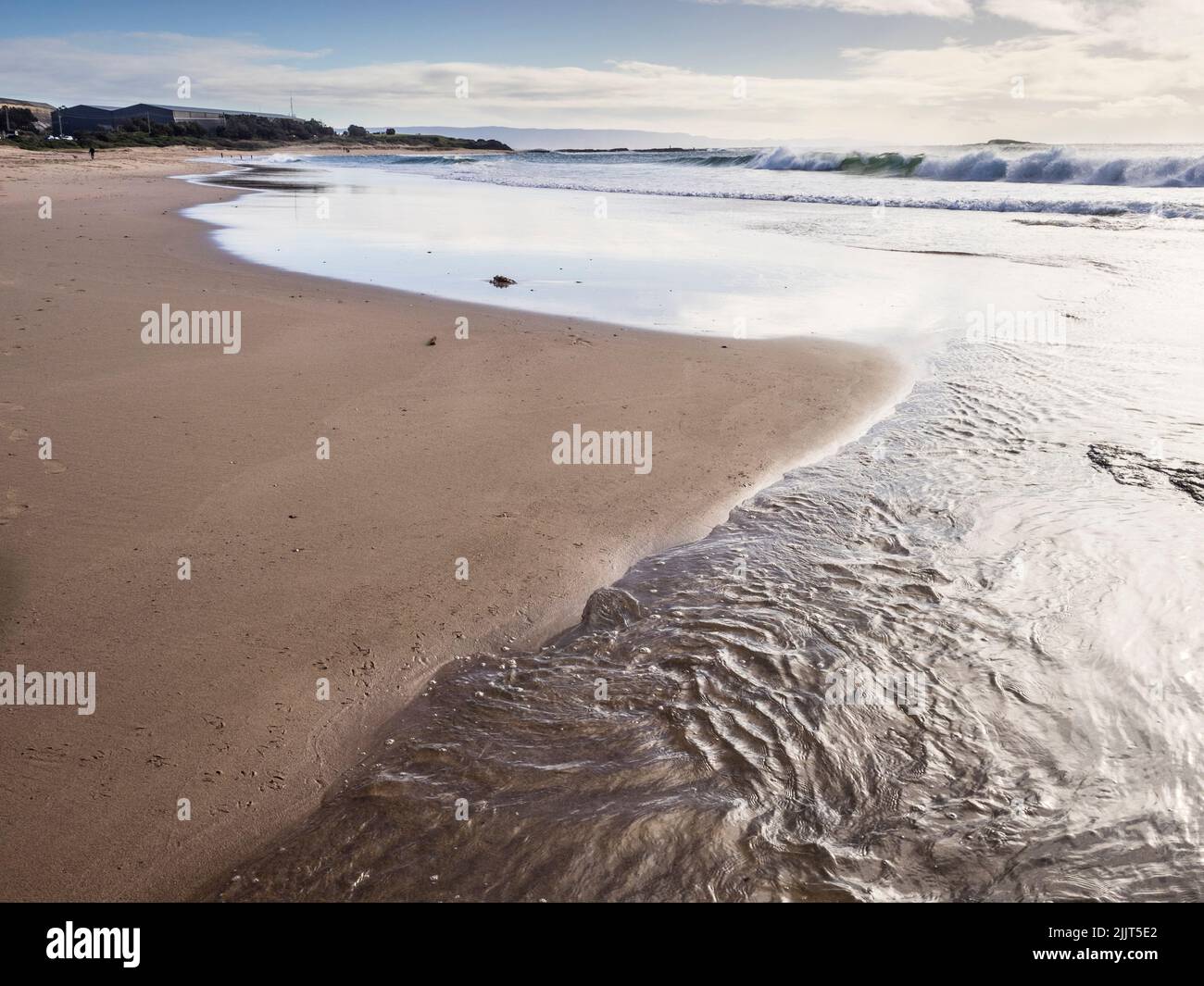 Tidal ripple patterns at North Beach, Port Kembla Stock Photo - Alamy