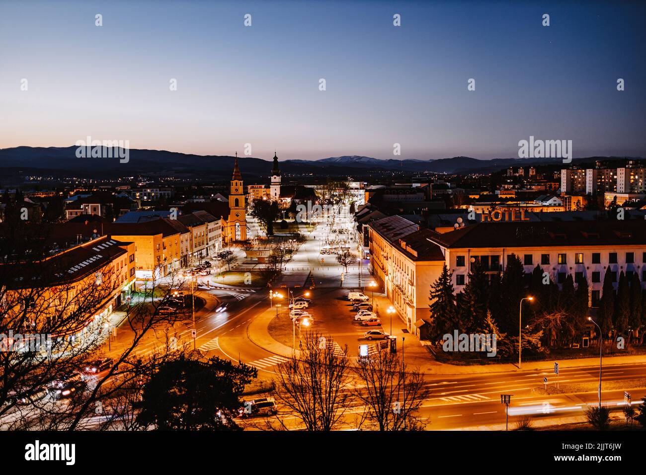 The Main square of Zvolen city, buildings and street lights at the blue