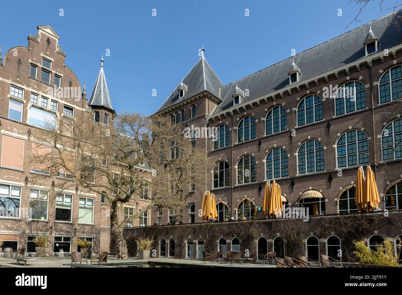 Restaurant and exterior facade architecture of historic building Tropics Institute and museum in Amsterdam Stock Photo