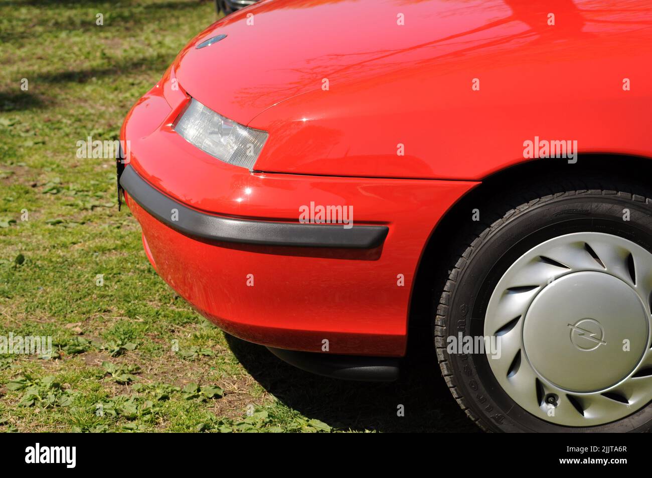 An old red Opel Calibra on display at a car show Stock Photo