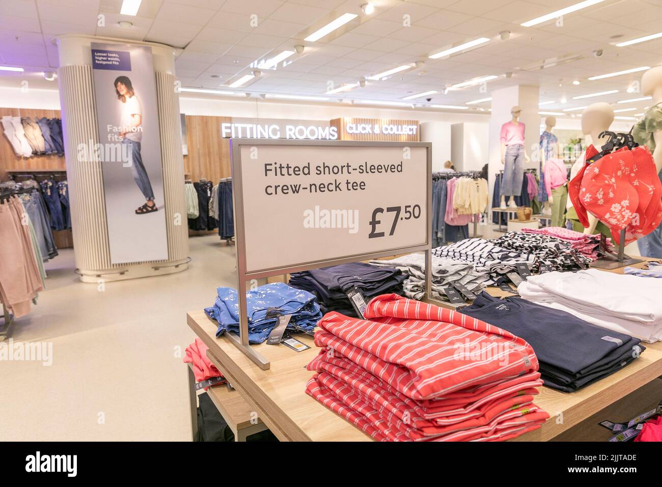 Marks and Spencer store interior, Womens clothing area, fitted short sleeved crew neck tee t shirts for sale,Manchester,England,UK Stock Photo