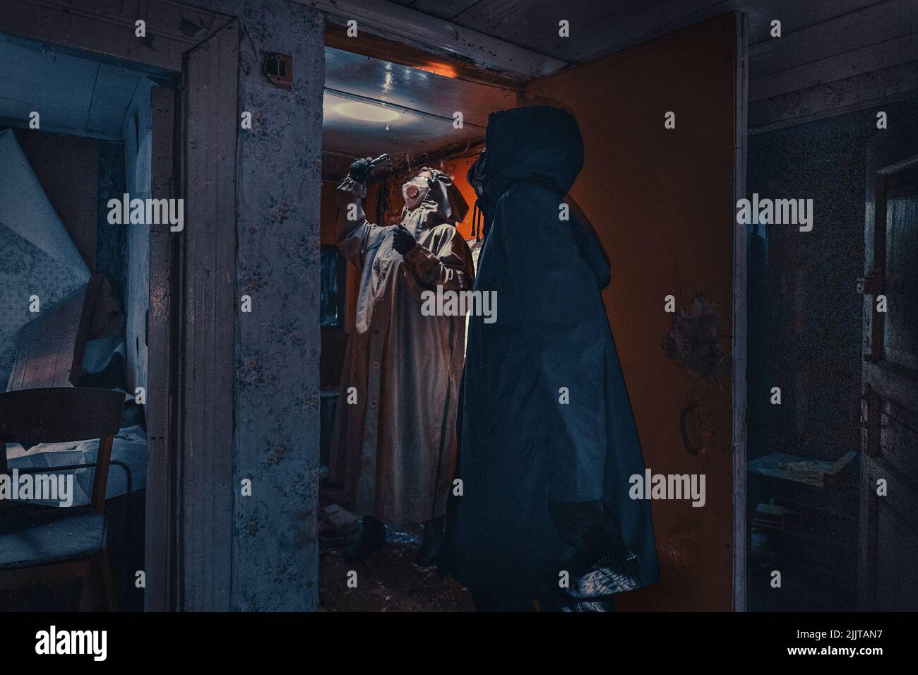 Fictional movie poster. People with flashlights, masks and protective