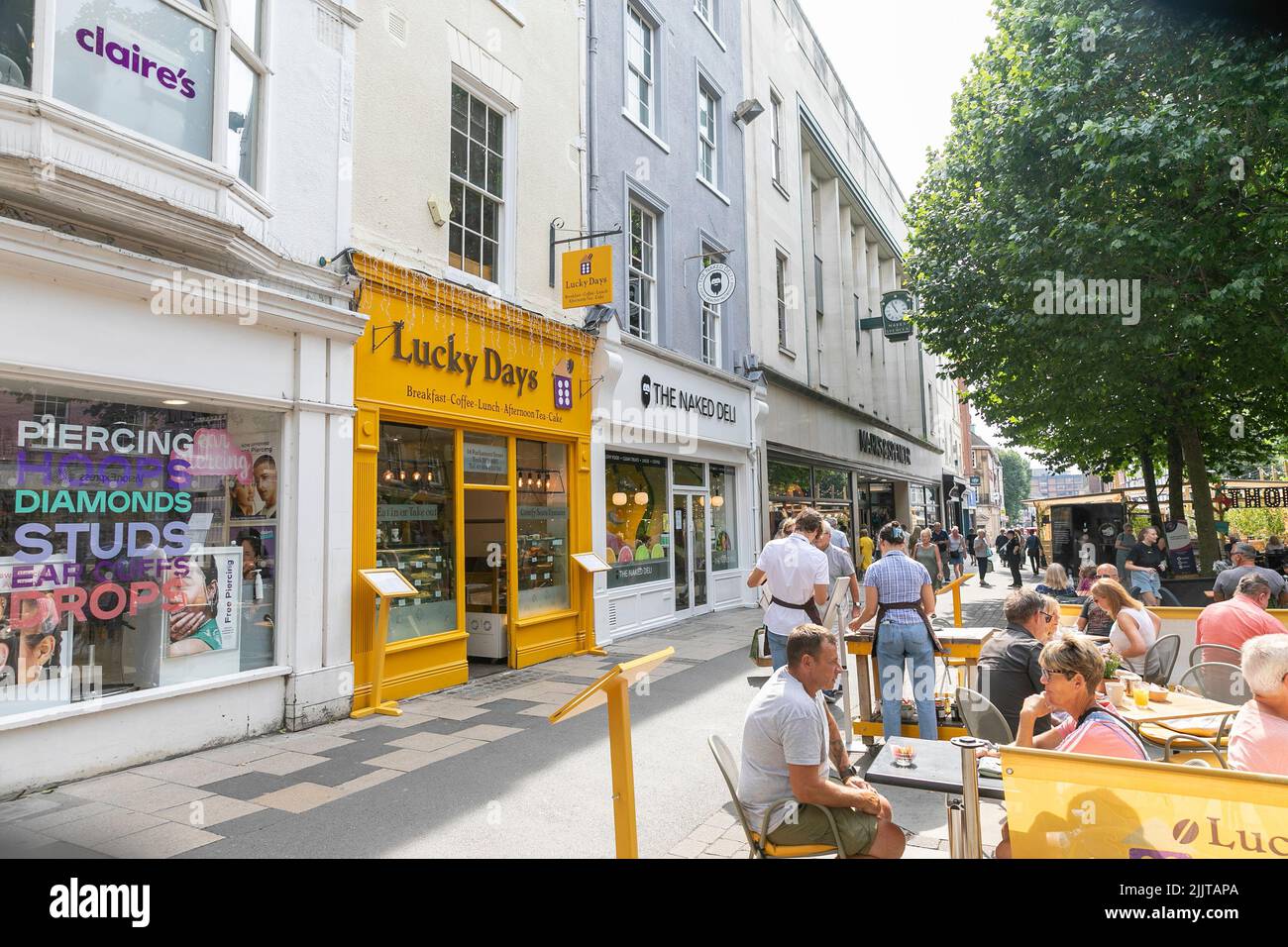 City of York, people eating outside Lucky days cafe in the city centre,Yorkshire,England,UK,summer 2022 Stock Photo