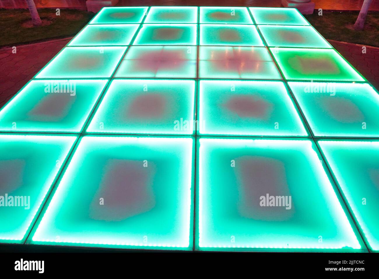 a-cyan-led-dance-floor-at-a-wedding-reception-stock-photo-alamy