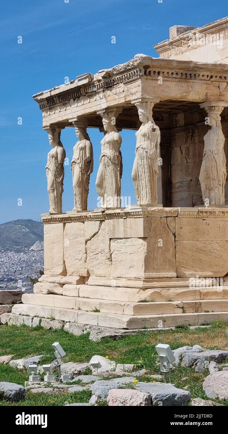 A vertical shot of The Erechtheion or Temple of Athena Polias, an ancient Greek Iconic temple Stock Photo