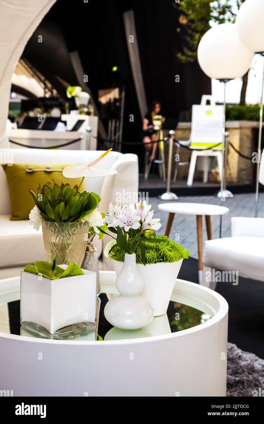 Luxury elegant flower pots on a table for an event party or wedding