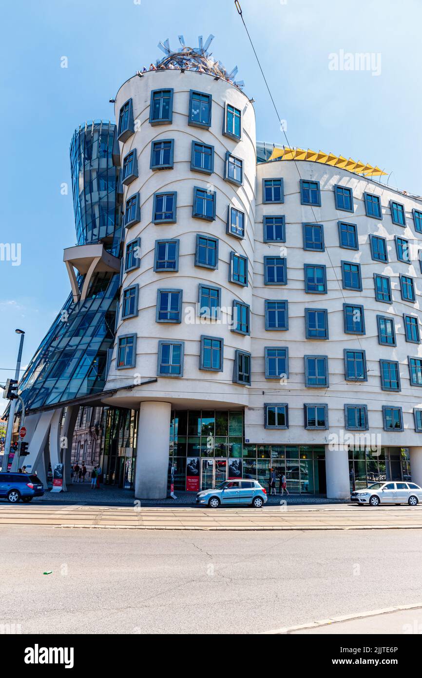 Rasinb A vertical shot of the Dancing House in Rasin Embankment, Prague Stock ...