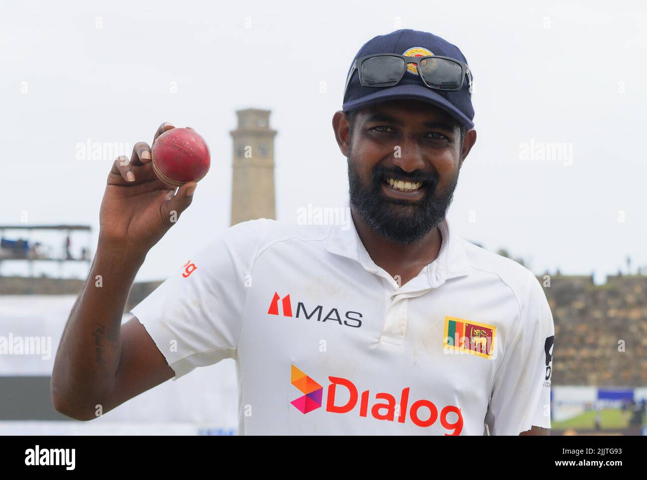 Galle, Sri Lanka. 28th July 2022. Sri Lanka's Prabath Jayasuriya raises the ball to the crowd after he had taken 5 wickets in the innings during the 5th day of the 2nd test cricket match between Sri Lanka vs Pakistan at the Galle International Cricket Stadium in Galle on 28th July, 2022. Viraj Kothalwala/Alamy Live News Stock Photo