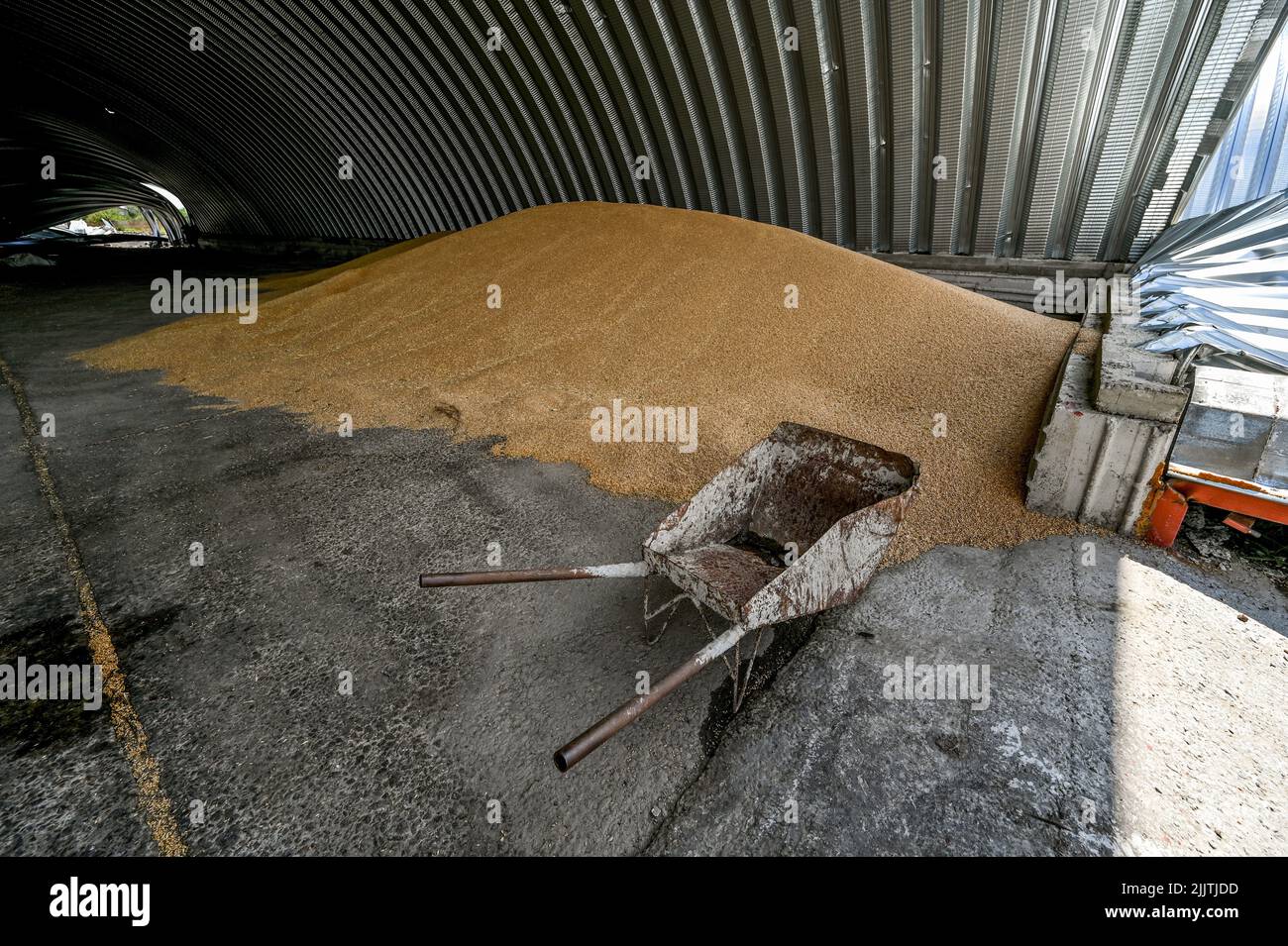 ZAPORIZHZHIA REGION, UKRAINE - JULY 27, 2022 - The premises of an agricultural enterprise show damage caused by the missile attack of the Russian troo Stock Photo