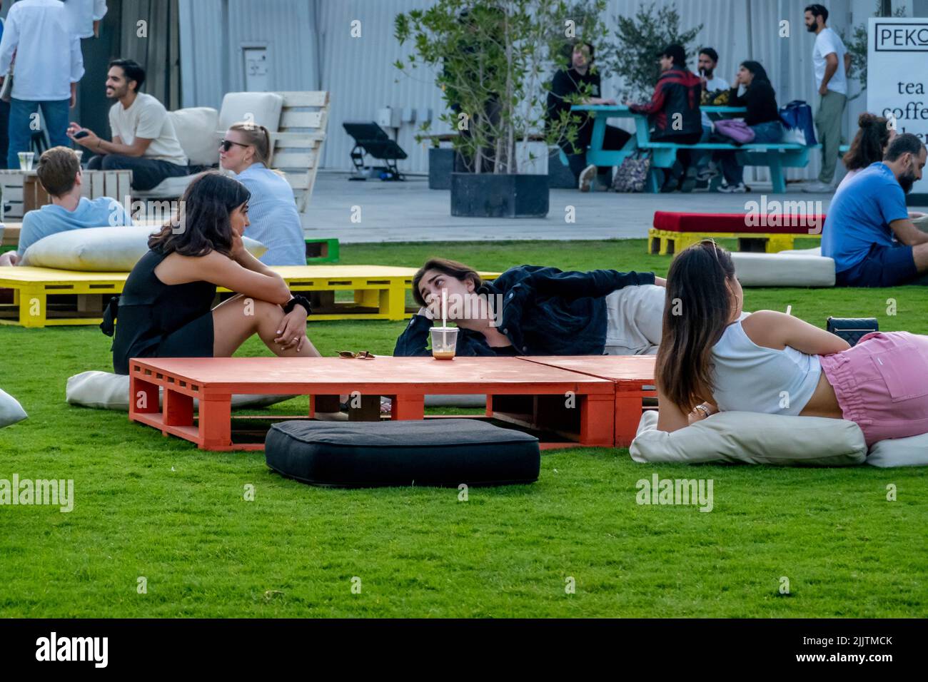 A view of locals and tourists chilling in Alserkal Avenue in Dubai, UAE Stock Photo